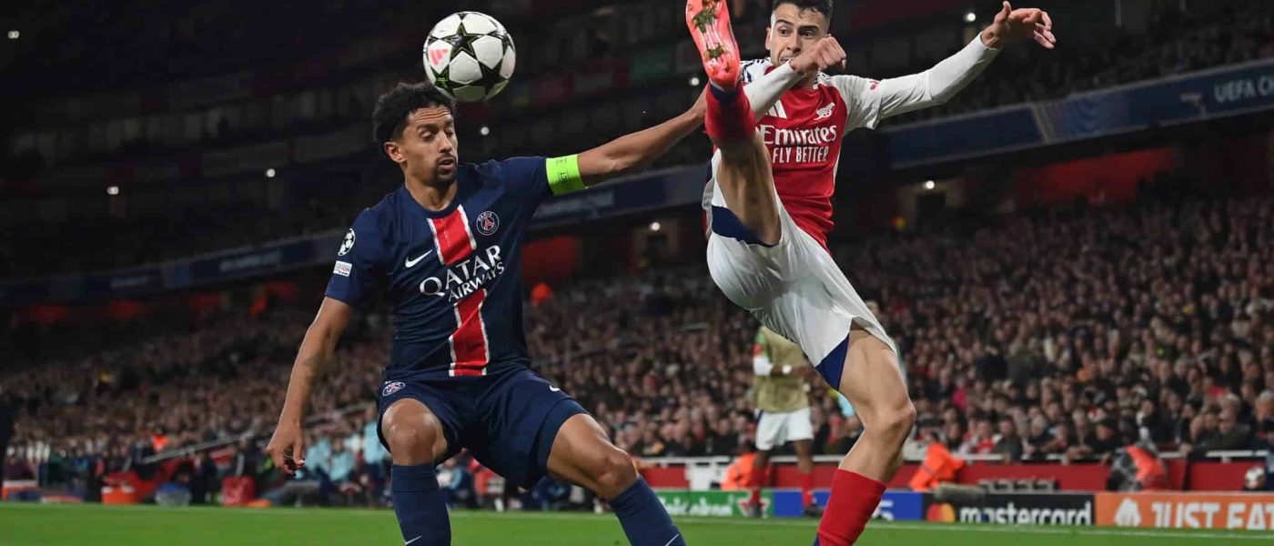 TOPSHOT - Paris Saint-Germain's Brazilian defender #05 Marquinhos (L) vies with Arsenal's Brazilian midfielder #11 Gabriel Martinelli during the UEFA Champions League football match between Arsenal and Paris Saint-Germain (PSG) at the Emirates Stadium in north London on October 1, 2024. (Photo by Glyn KIRK / AFP) (Photo by GLYN KIRK/AFP via Getty Images)