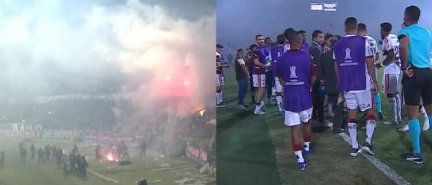 Bengalas y humo en la tribuna norte del estadio Atanasio Girardot durante el partido suspendido entre Independiente Medellín y Flamengo por Copa Libertadores